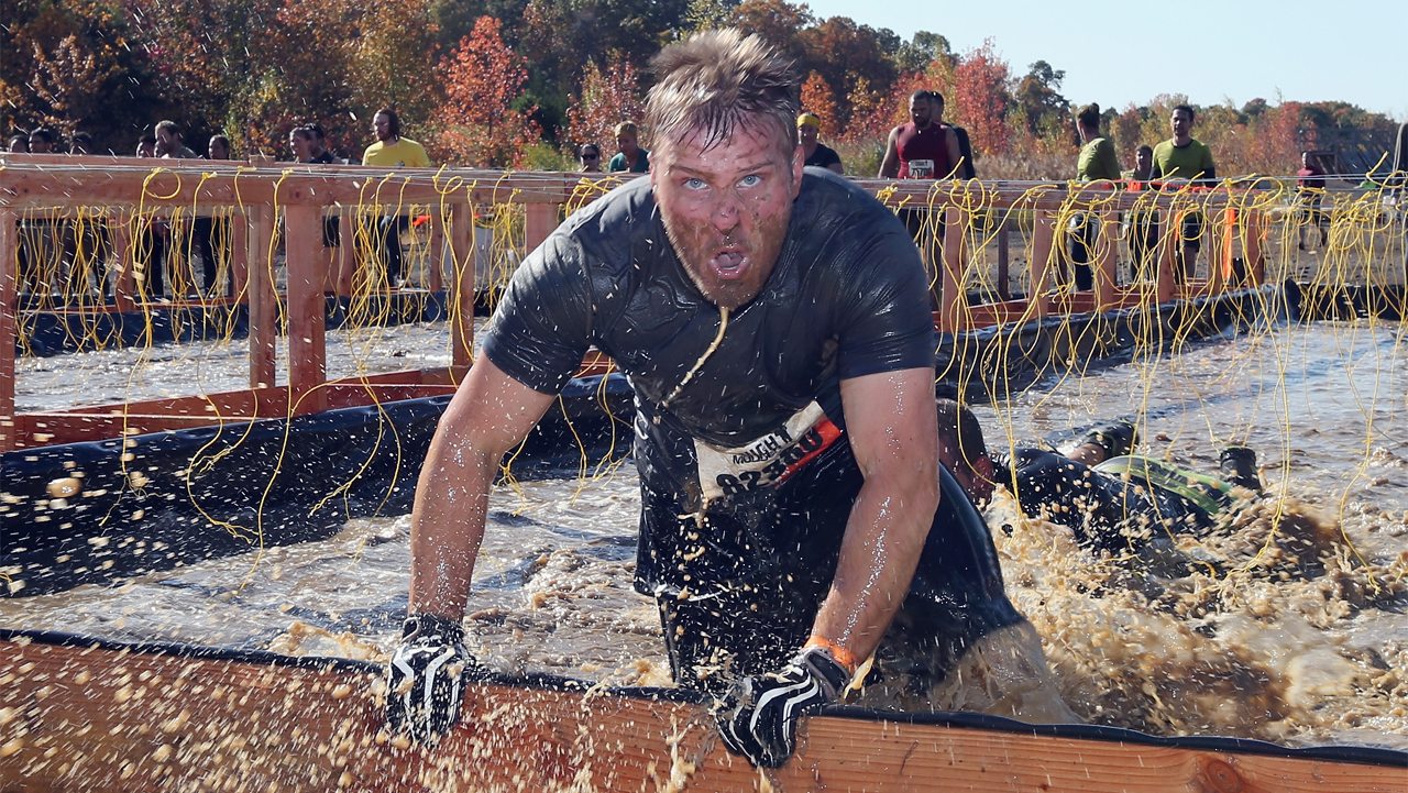 ENGLISHTOWN, NJ - OCTOBER 20: Participants take part in the Tough Mudder event at Raceway Park on October 20, 2012 in Englishtown, New Jersey. (Photo by Bruce Bennett/Getty Images)